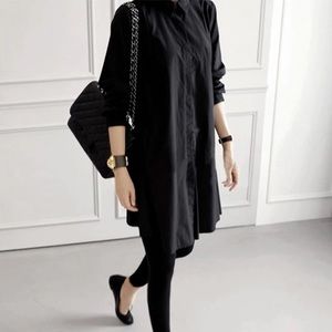 Women’s black A-Line Tunic top with Pockets